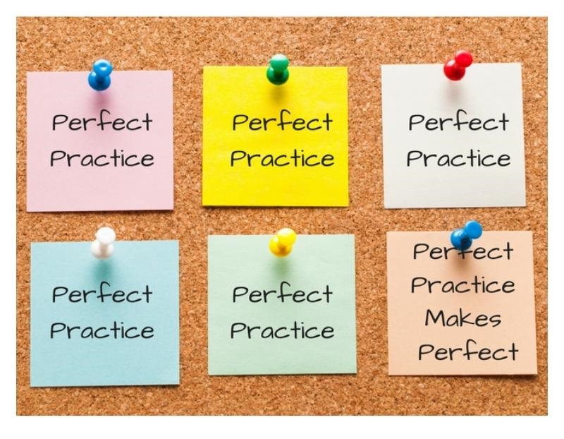 image of bulletin board with post-it notes saying perfect practice makes perfect in medical coding